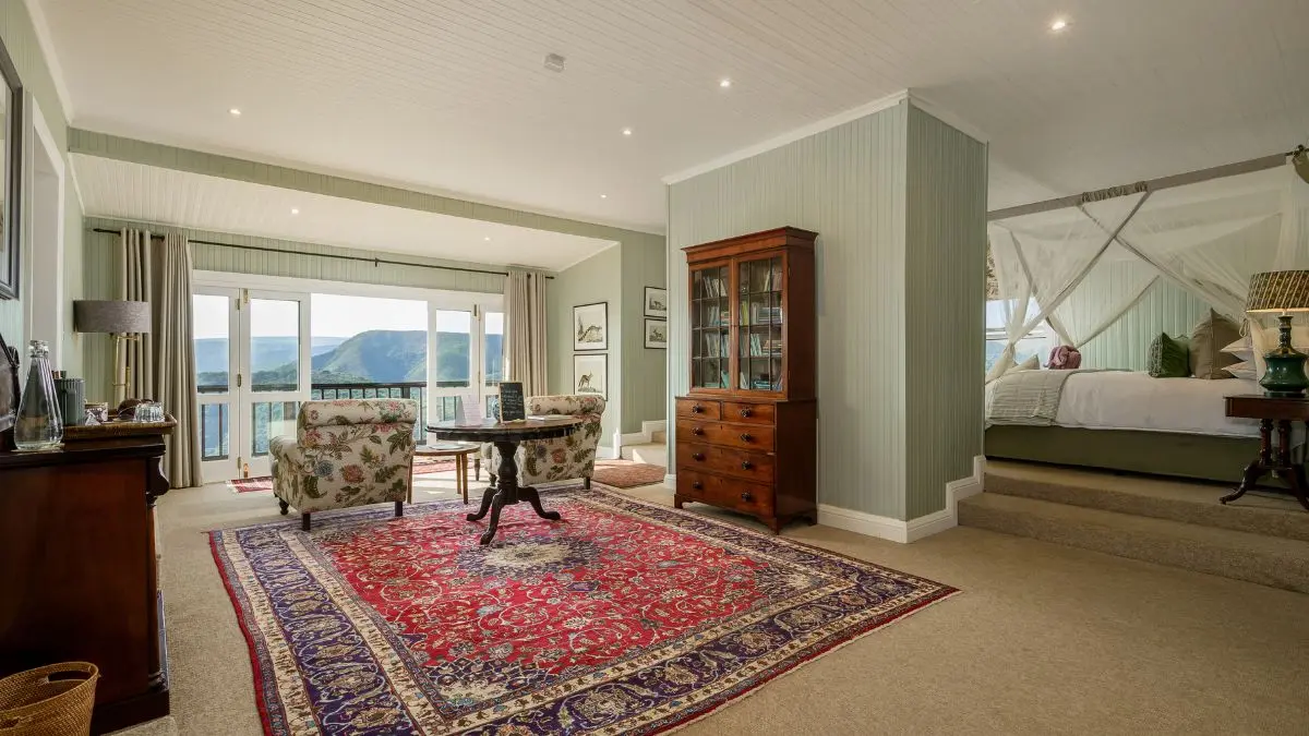 luxury suite with opulent decor and a view of valleys and mountains