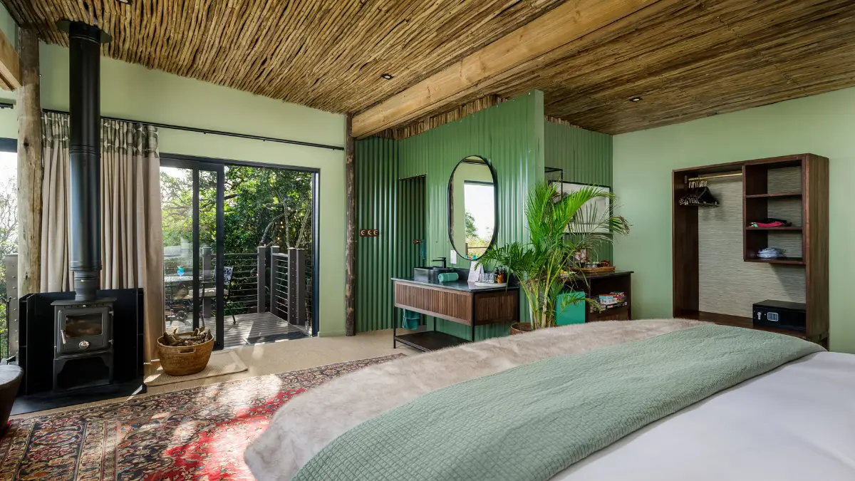 safari lodge bedroom with green walls