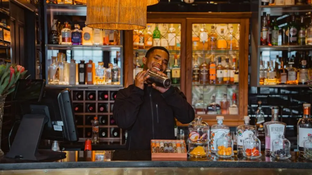 Barman preparing drinks at La Fontaine